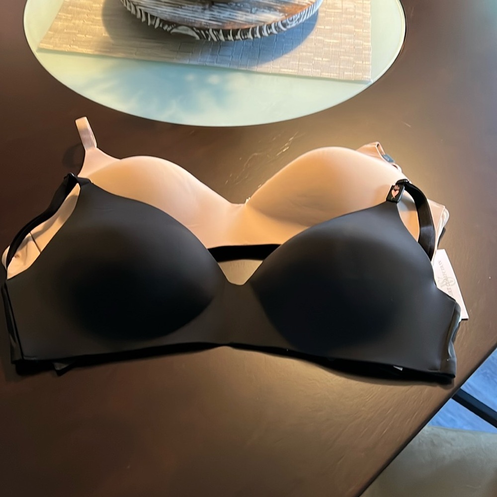 Victoias Secret T-Shirt Bras.  One Black one Tan size 38D